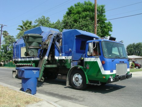 Commercial skip ready for delivery in an Islington business area